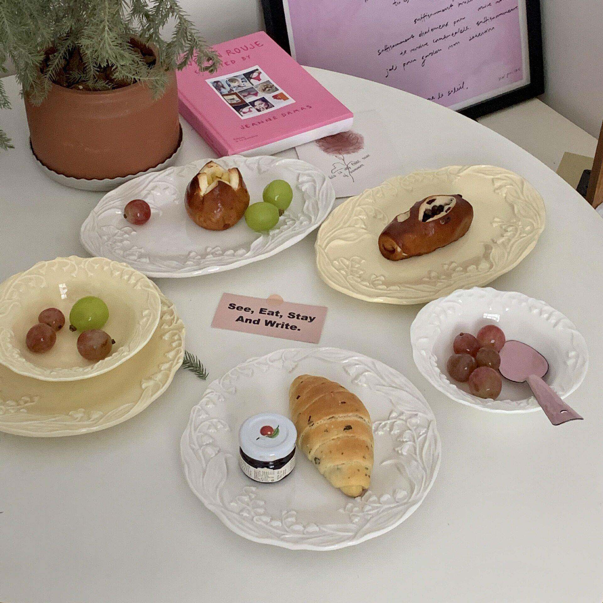 ins风浮雕铃兰花盘子碗套装奶黄色花朵椭圆盘甜品碗家用菜盘点心