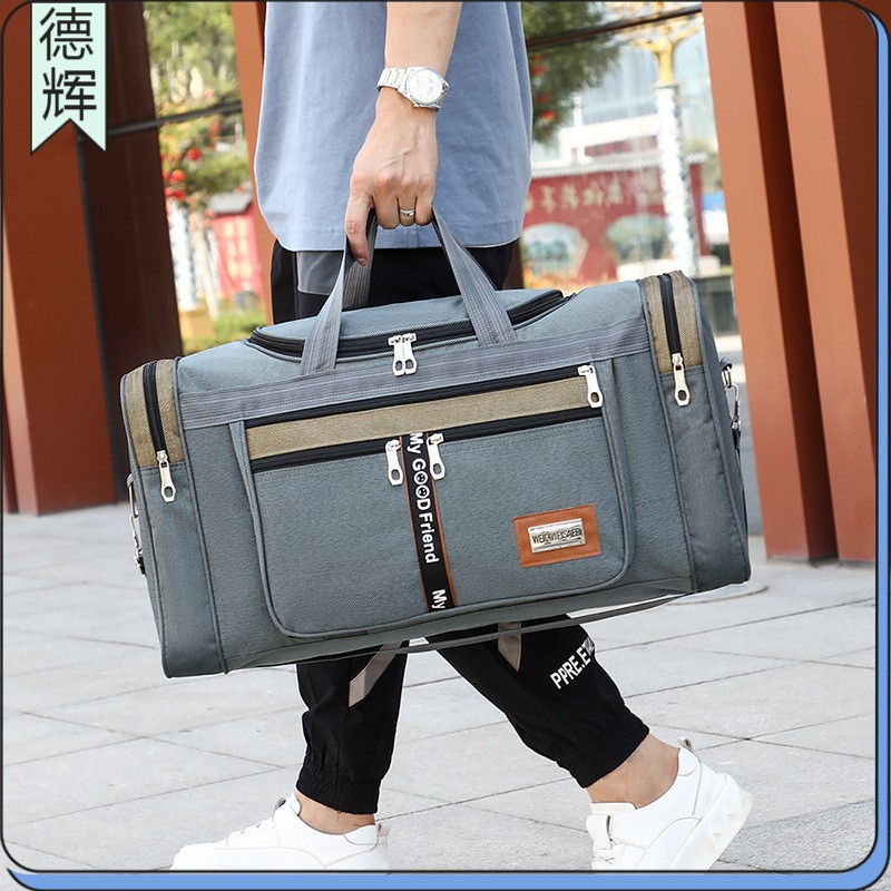 LARGE-CAPACITY FOLDABLE HAND-HELD TRAVEL BAG MALE AND FEMALE STUDENTS LONG AND SHORT TRAVEL LUGGAGE BAG WATERPROOF