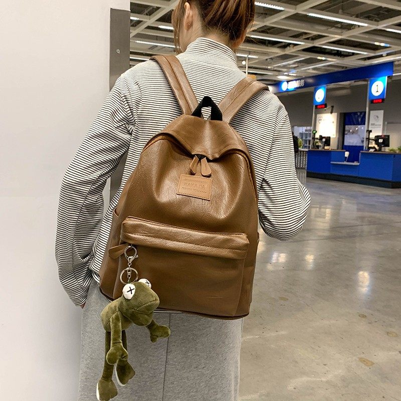 港风复古女士包包2025新款简约百搭大容量双肩包时尚书包男背包女