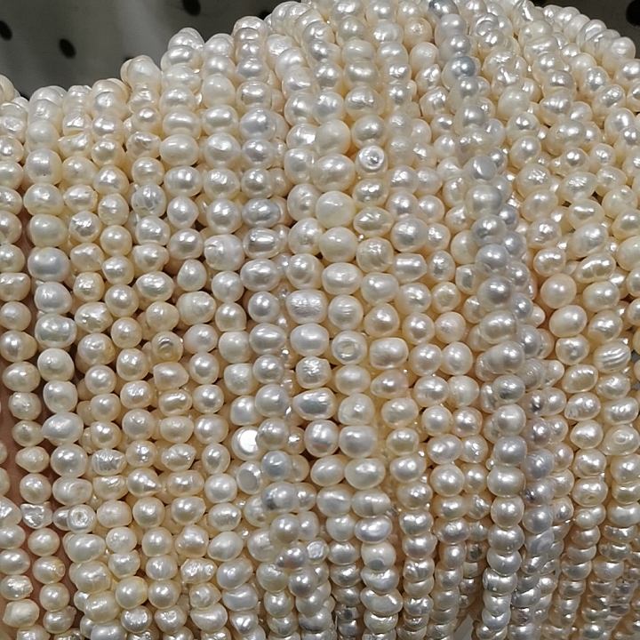 特价处理瑕疵外贸款5-6mm冲头圆天然淡水珍珠散珠项链半成品一条
