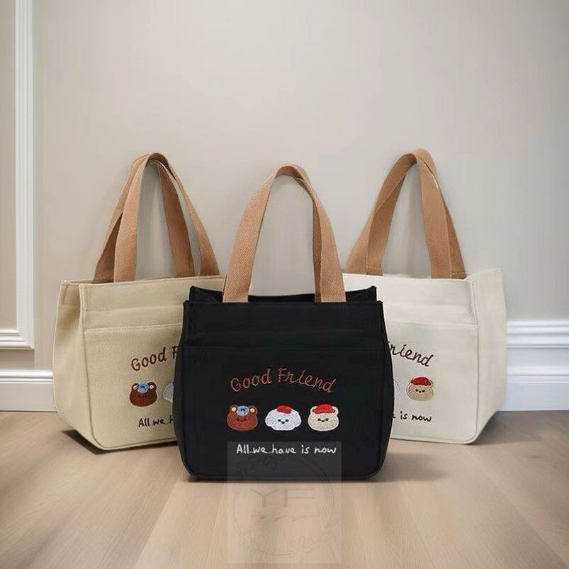 新款高颜值帆布手提包简约上班拎包外出学生百搭通勤饭盒便当饭袋