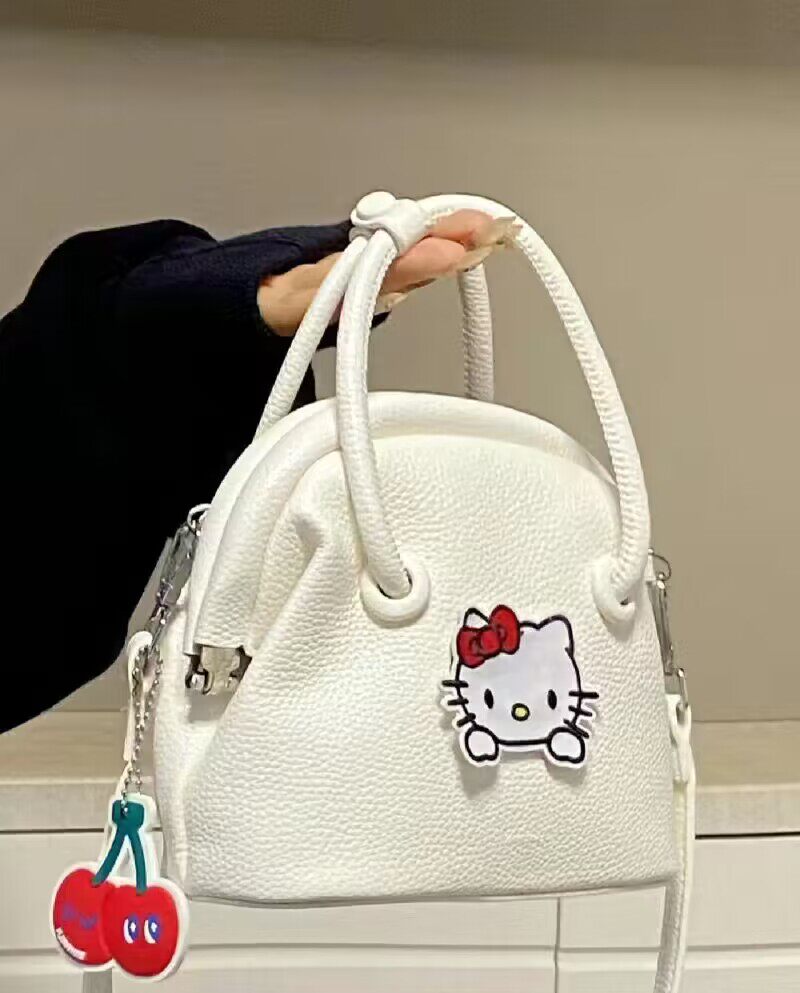 卡通HelloKitty女包荔枝纹斜挎包鲶鱼包奶油小方包单肩包手提包女_虎窝淘