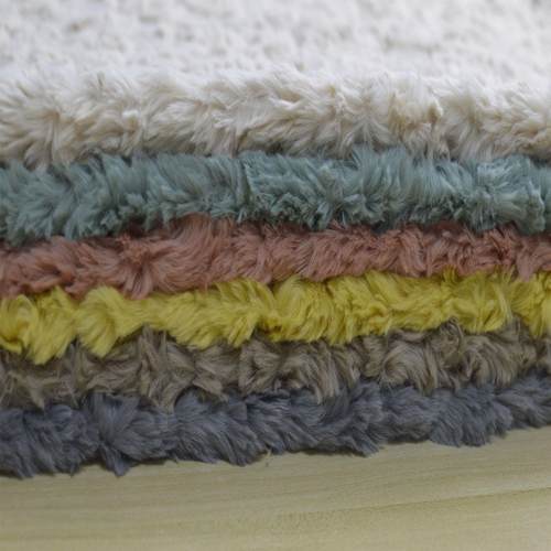 现货供应新款小兔绒刷花800克秋冬时装服装鞋材面料小兔毛喷花