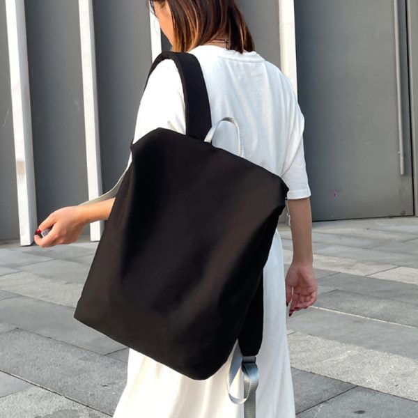 旅行双肩包女2024新款时尚设计感小众简约大学生电脑背包男士休闲