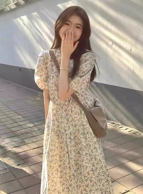 温柔风蓝色碎花连衣裙女2025夏季法式复古圆领泡泡袖宽松显瘦长裙