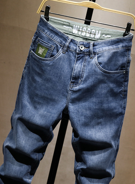 春夏薄款牛仔裤男款修身小脚蓝色潮牌时尚百搭青年弹力哈伦裤子男