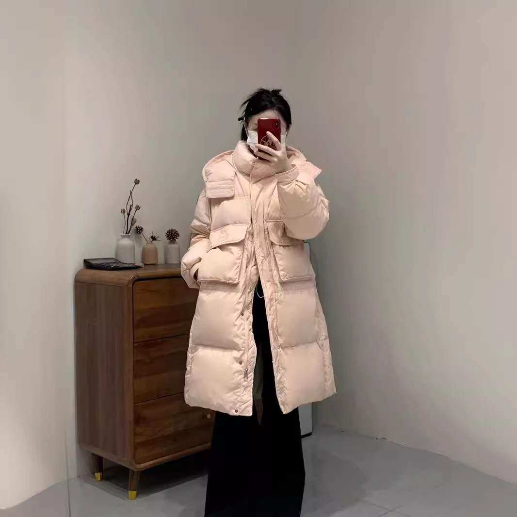 韩国版同款大口袋新款反季服女中长款过膝加厚连帽白外套