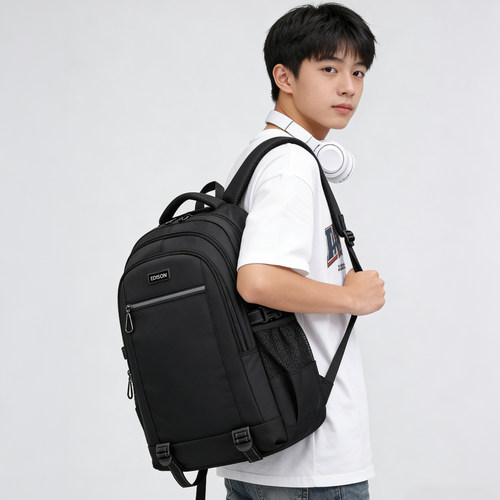 爱迪生初高中生减负护脊书包大容量反光迷彩双肩包男女同款背包