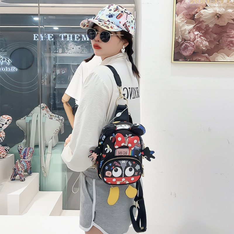 可爱卡通街头双肩斜跨女涤纶印花
