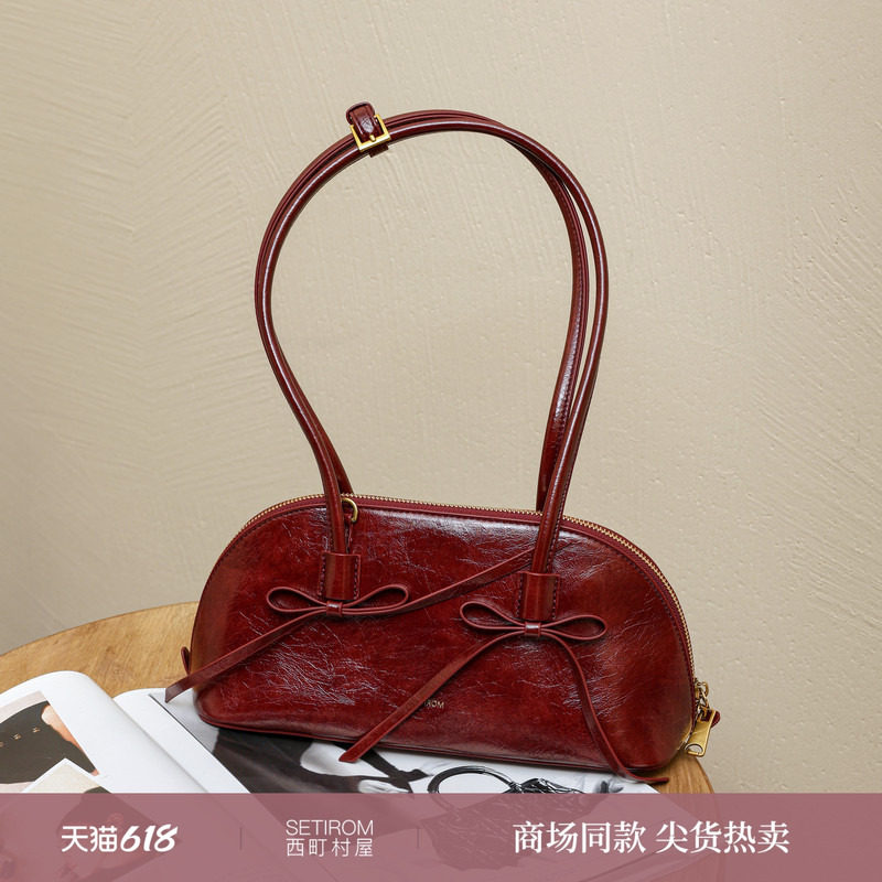 西町村屋气质感手提包女秋冬新款小众蝴蝶结设计贝壳包XAAD60031