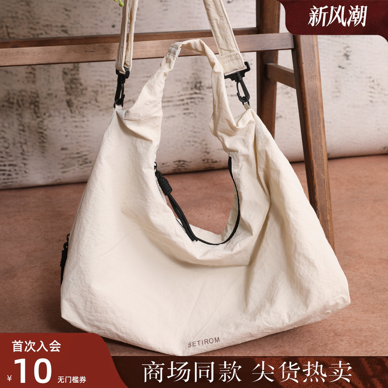 西町村屋韩系休闲运动风单肩包