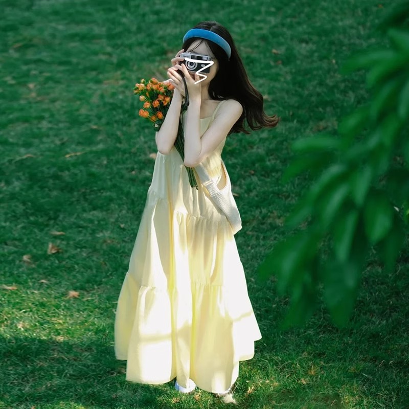 温柔风森系仙女黄色吊带连衣裙女夏季2025新款气质收腰显瘦长裙子