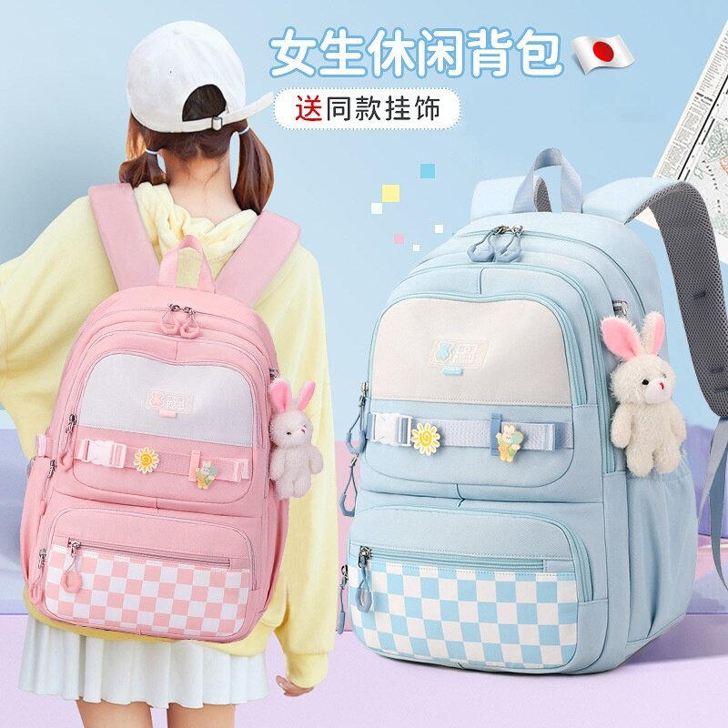 小学生书包女初中生大容量超轻便减负护脊双肩背包简约校园风防水