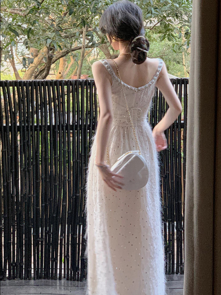 FRENCH SENSE OF LUXURY HEAVY WORK FEATHERS SEQUINS SLIP DRESSES WOMENS SUMMER WAIST CINCHING THIN AND ELEGANT TEMPERAMENT LONG SKIRT TIDE