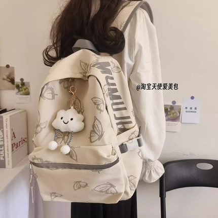 日本进口书包女生初中学生减负背包女大容量护脊蝴蝶学生双肩包