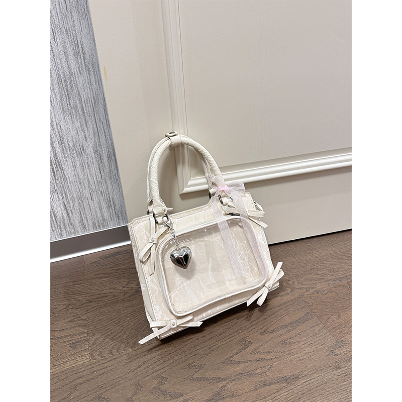 小食量蝴蝶结痛包休闲撞色卡通可爱小众娃包二次元百搭通勤斜挎包