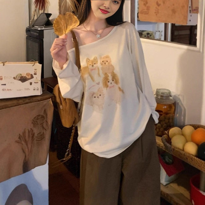 趣味卡通小狗印花斜肩长袖t恤女早秋季宽松休闲露肩减龄百搭上衣