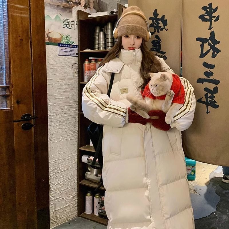 白色长款羽绒服女冬2025年新款中长款连帽过膝加厚棉服外套学院风