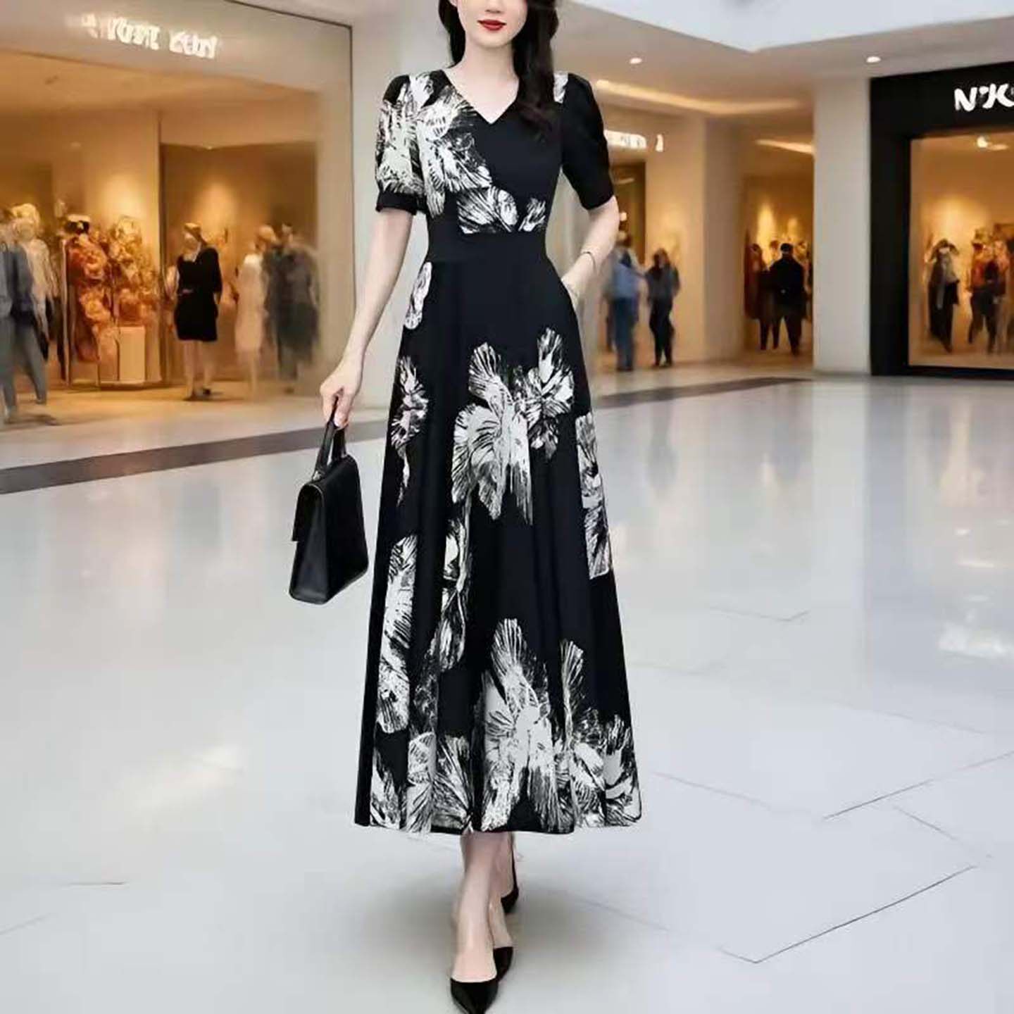 宏嫩轻奢女士时尚连衣裙2026夏季气质收腰显瘦黑色碎花A字长裙a4
