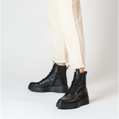 WONDERS西班牙原产进口圆头纯色绑带超轻厚底帅酷马丁靴女靴