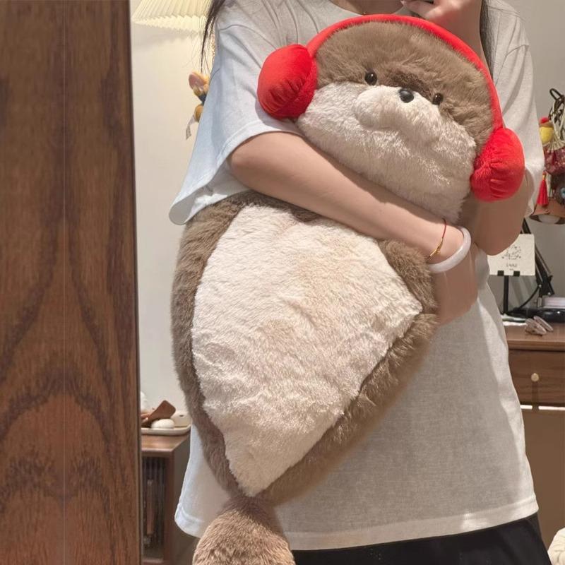 可爱耳机海豹玩偶睡觉抱公仔毛绒玩具海獭抱枕娃娃生日礼物女生软
