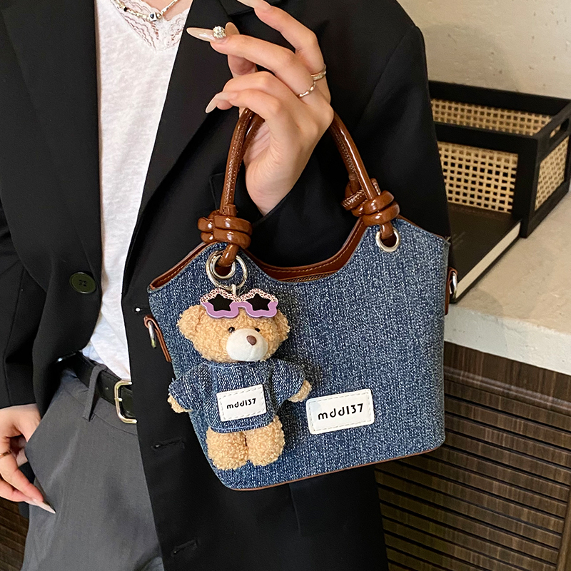 牛仔包包女式时尚复古斜挎水桶包