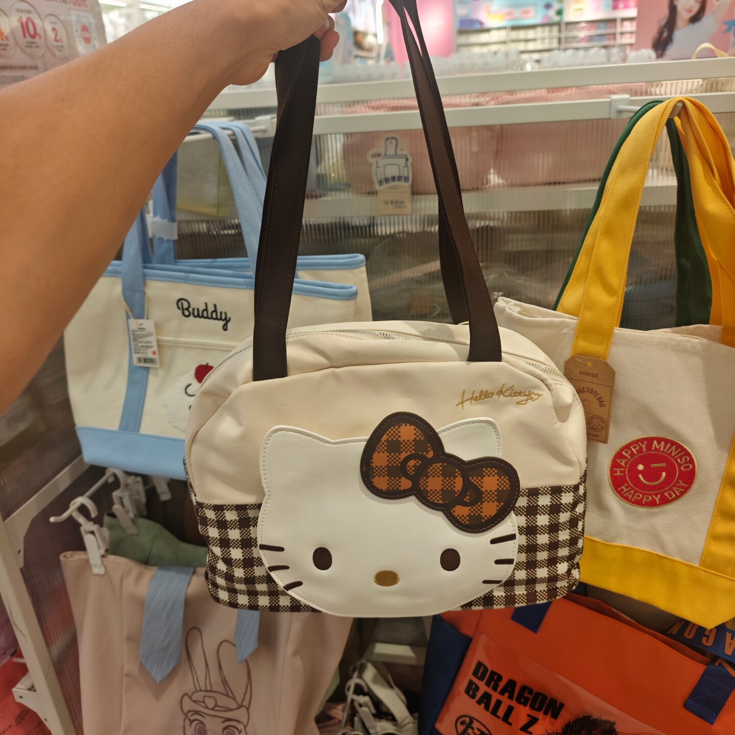 MINISO三丽鸥摩卡格纹系列hellokitty单肩包名创优品