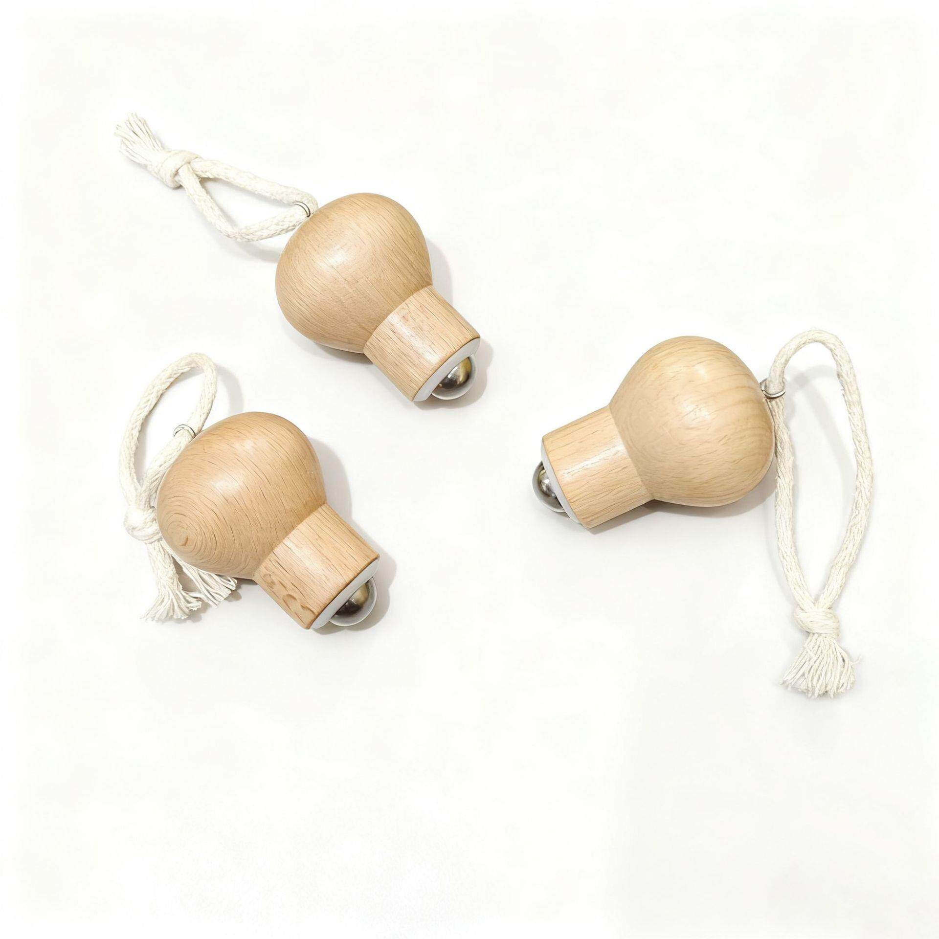 创意灯泡滚珠脸部按摩器迷你手拿禾木家用身体按摩疏通按摩器礼物