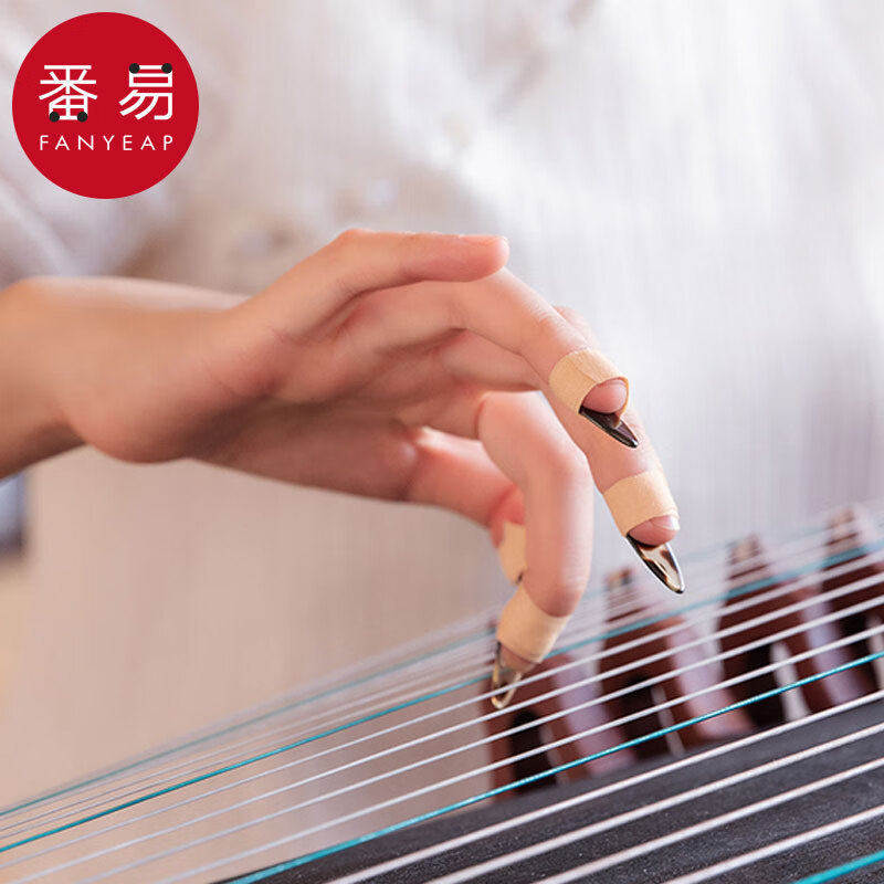 古筝指甲A1pn001-古筝指甲成人玳瑁色专业考级双面弧甲片胶布摇图片