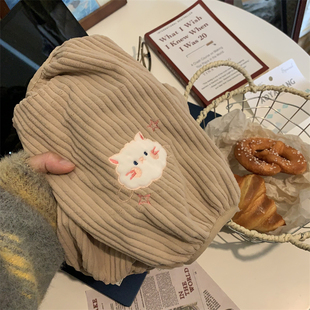 可爱卡通袖套女秋冬羽绒服防脏办公室奶咖色护袖学生纯色套袖长款