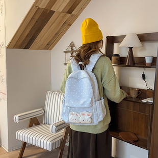 高颜值ins波点设计感书包女小学生轻便初中生痛包简约百搭双肩包