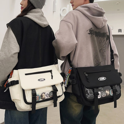 斜跨包男个性单肩包女学生微痛包