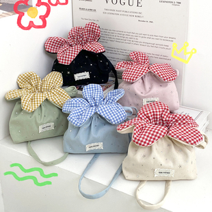 2026春季新款小清新花朵束口斜挎包亮闪星星帆布袋轻便遛弯手拎包