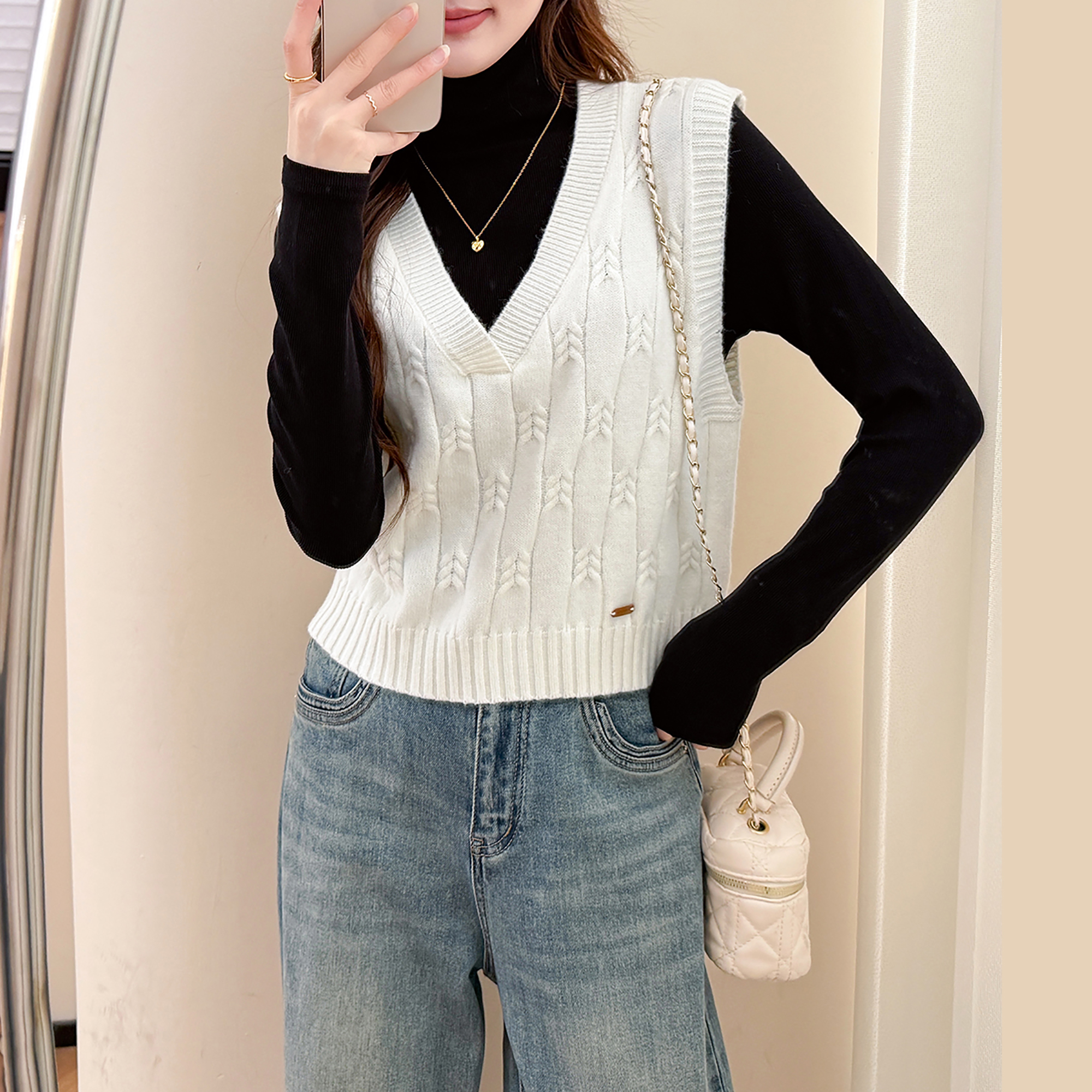 唐狮秋冬季女毛衣设计感绞花V领