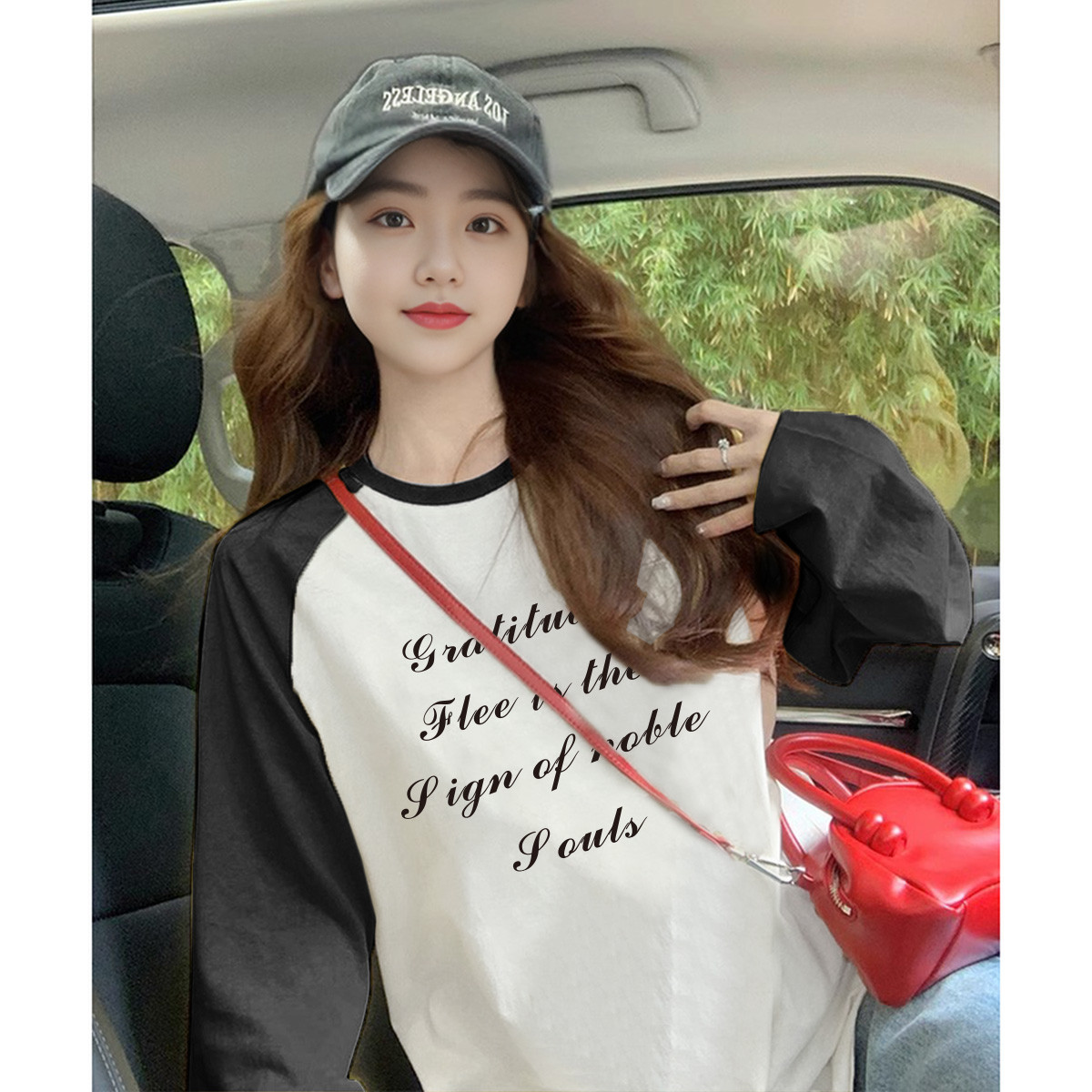 唐狮春秋长袖T恤女圆领插肩袖前