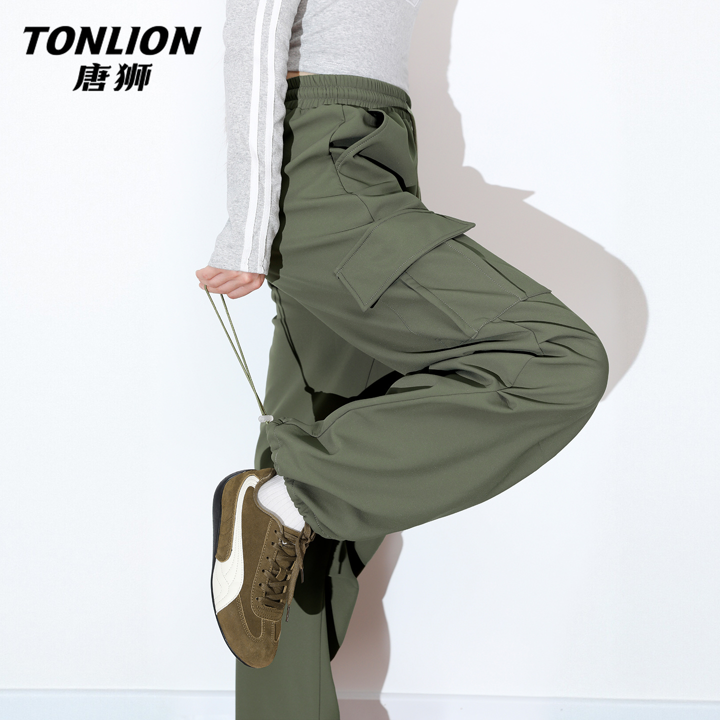 唐狮军绿色工装裤女款2025新款秋冬季学生软壳加绒加厚运动裤VB