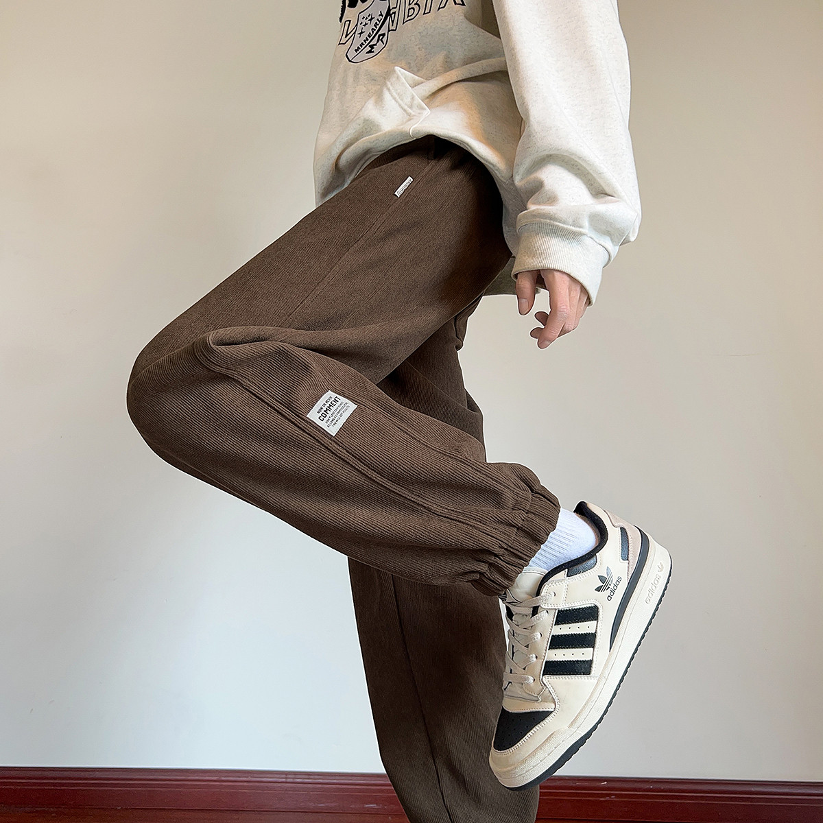 唐狮秋冬季休闲长裤男梭织简约设计束脚裤宽松显瘦美拉德男裤TUTA