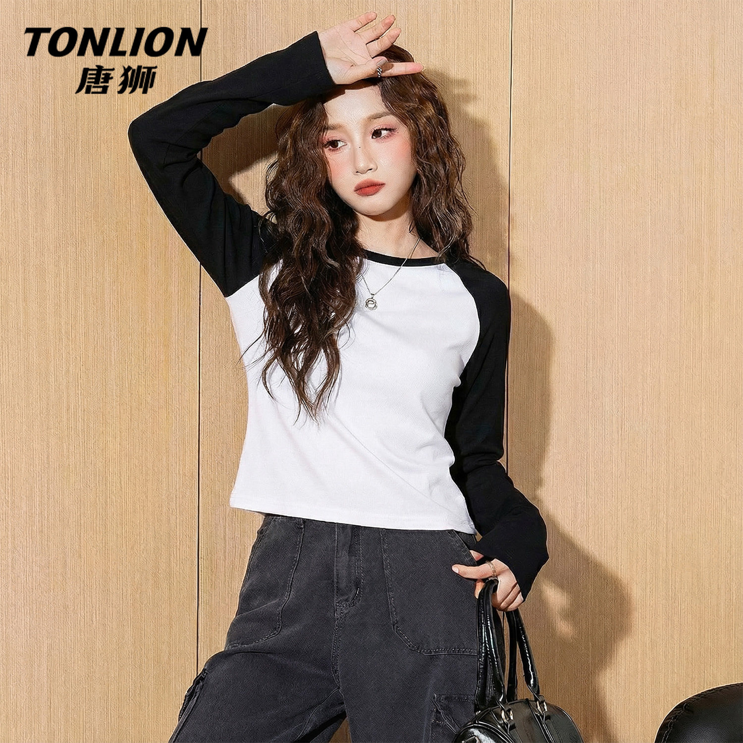 唐狮官方黑色插肩长袖t恤女春秋款2026新款女士修身显瘦上衣女V