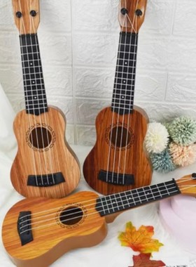 新疆西藏包邮网红尤克里里吉他迷你儿童玩具乐器宝抓周用品拍照道