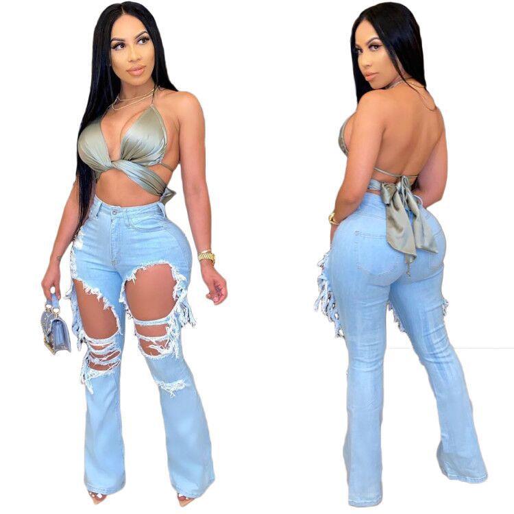 Women's washed flared jeans with holes