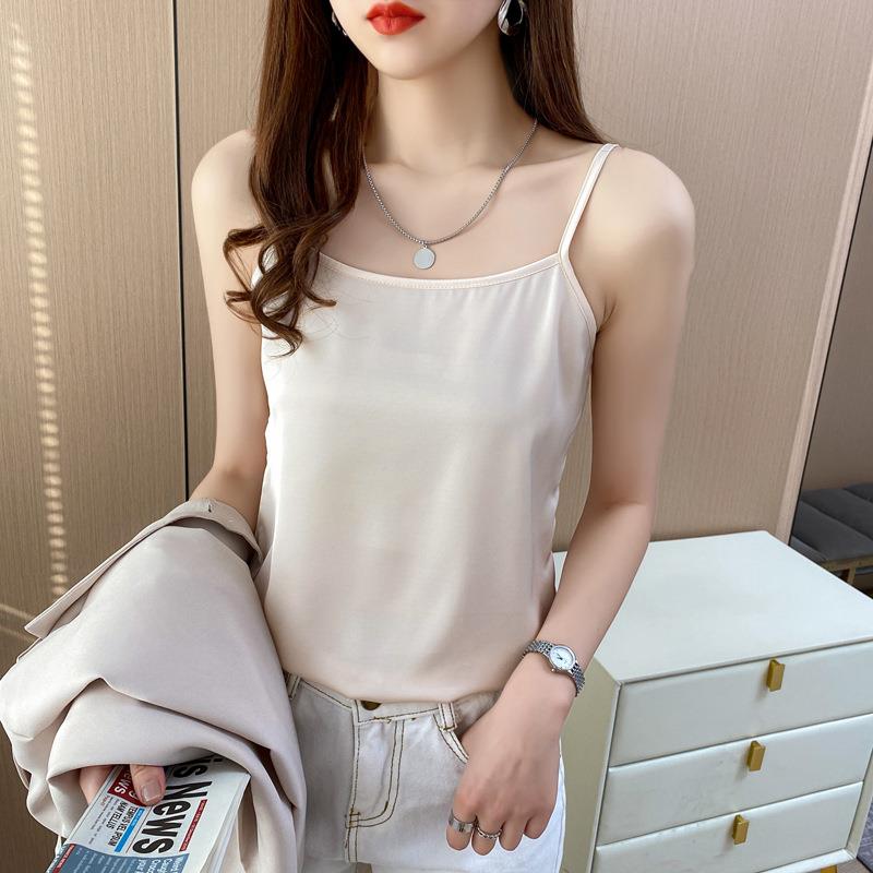 inner base suit with slim-fitting outerwear as wear to top