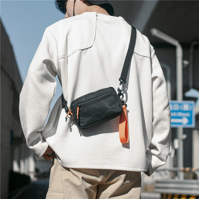 斜挎包女ins风简约休闲户外轻便日系潮牌单肩包男工装通勤小背包