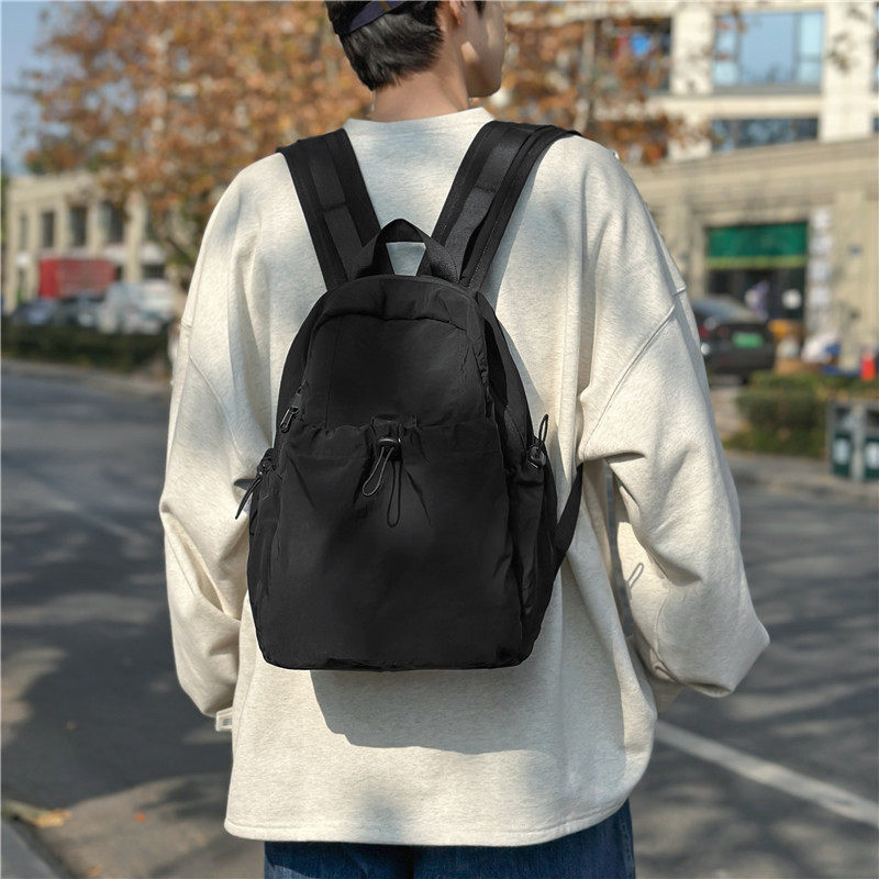 双肩包男2025新款户外登山小背包日系ins轻便尼龙防水学生小书包