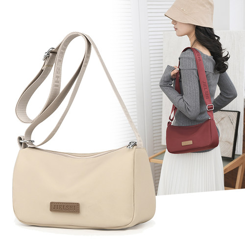 轻便牛津布斜挎小包包