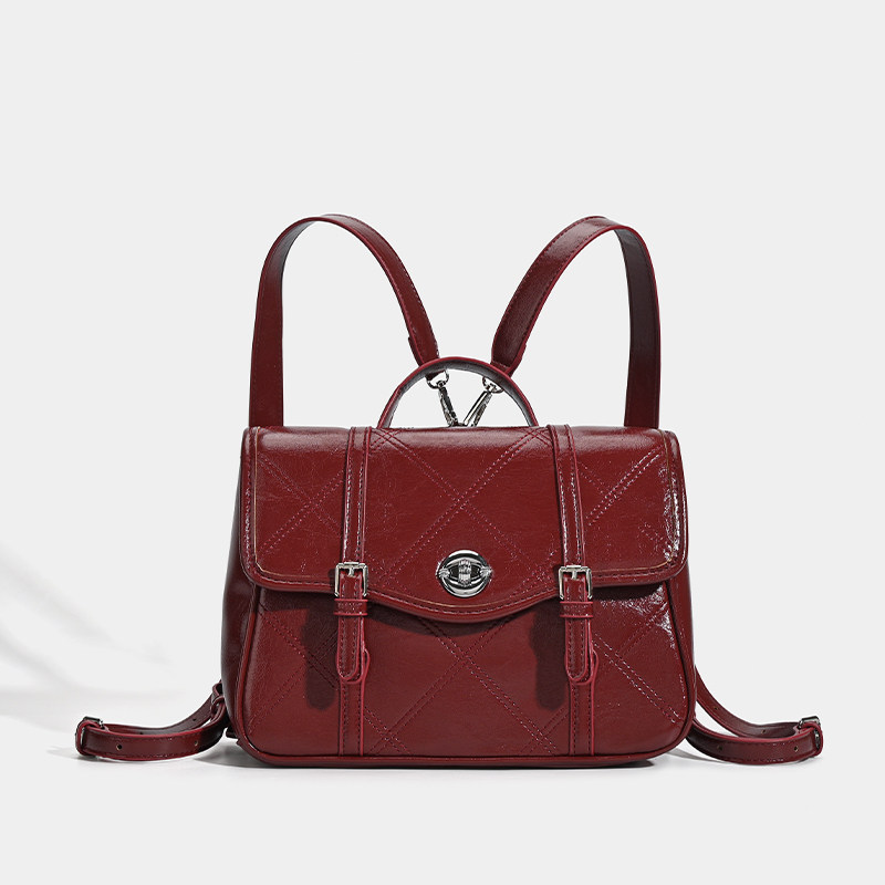 日本バッグ2025新款邮差双肩包女英伦学院风书包通勤大容量单肩包