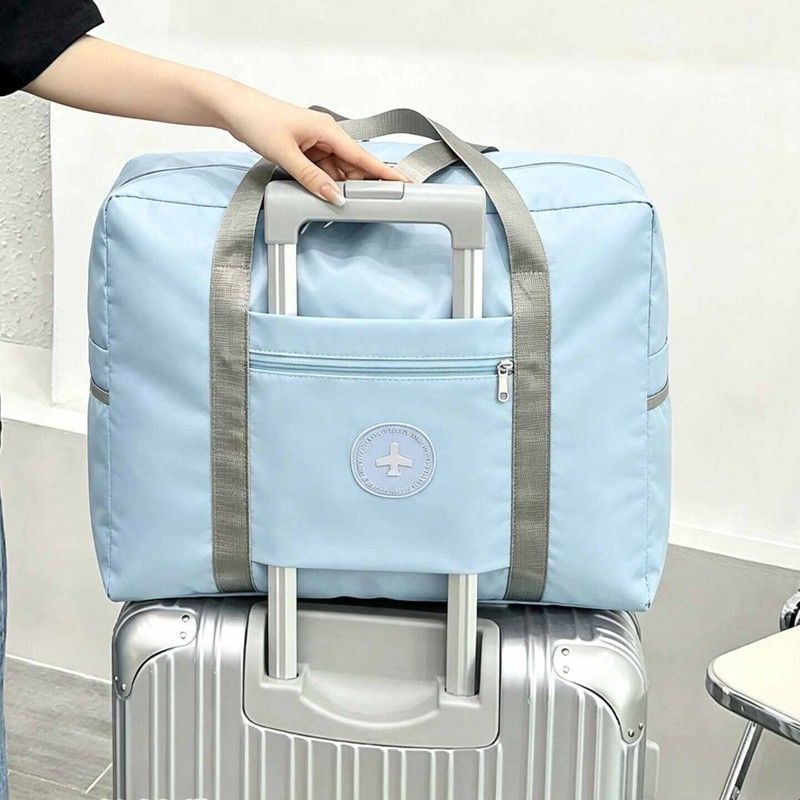 手提旅行登机包大容量防水简约轻便携折叠短途行李袋子套拉杆箱包