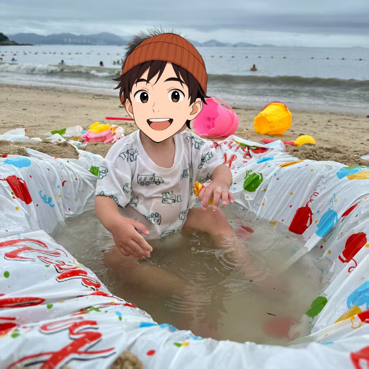 儿童海边旅游玩水塑料膜沙滩垫图片
