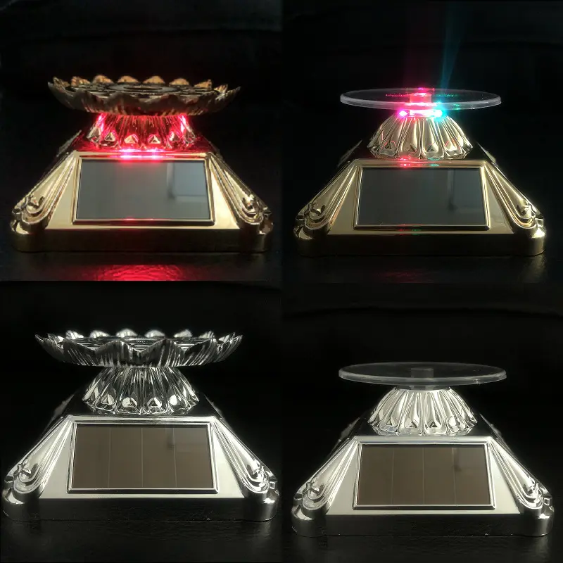 直销太阳能莲花旋转展示台led