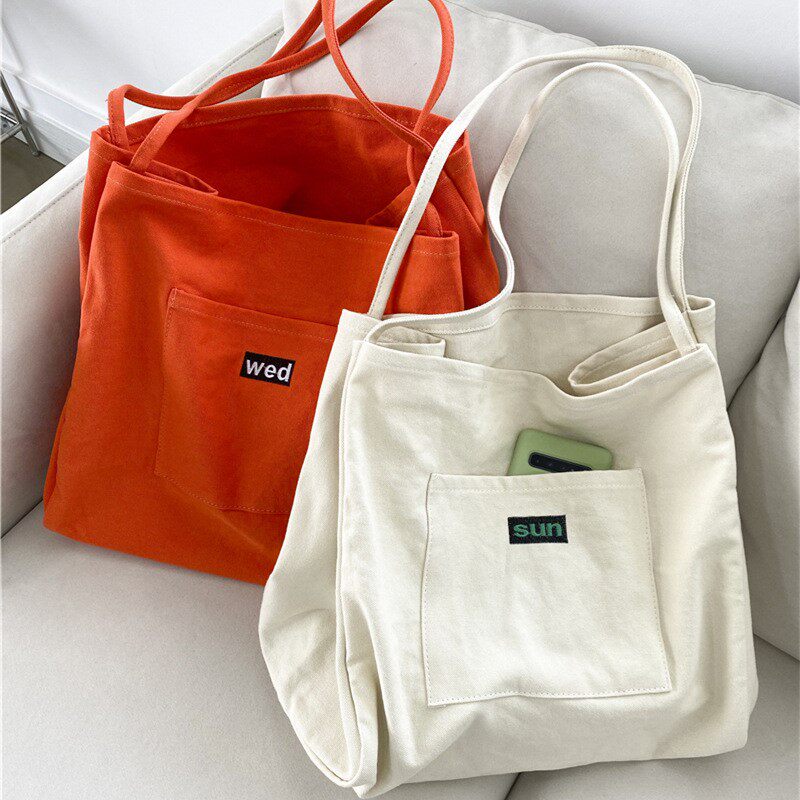 韩系ins帆布包2027新款时尚大容量红色简约托特包休闲单肩购物袋