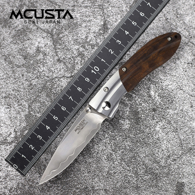 Mcusta传世家徽折叠刀日本进口